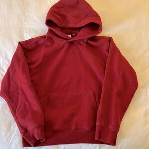 Aritzia TNA Superfleece Hoodie in Red. Size S.